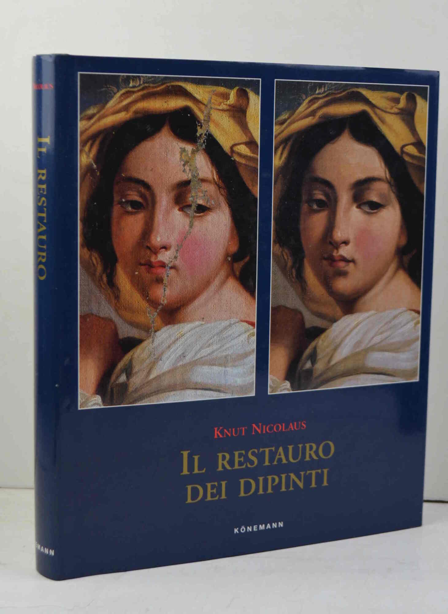 Il restauro dei dipinti.