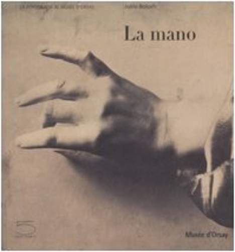 La mano.