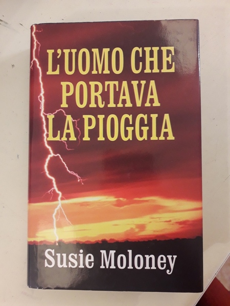 L'UOMO CHE PORTAVA LA PIOGGIA