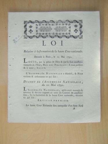 Loi relative à la formation de la haute Cour nationale …