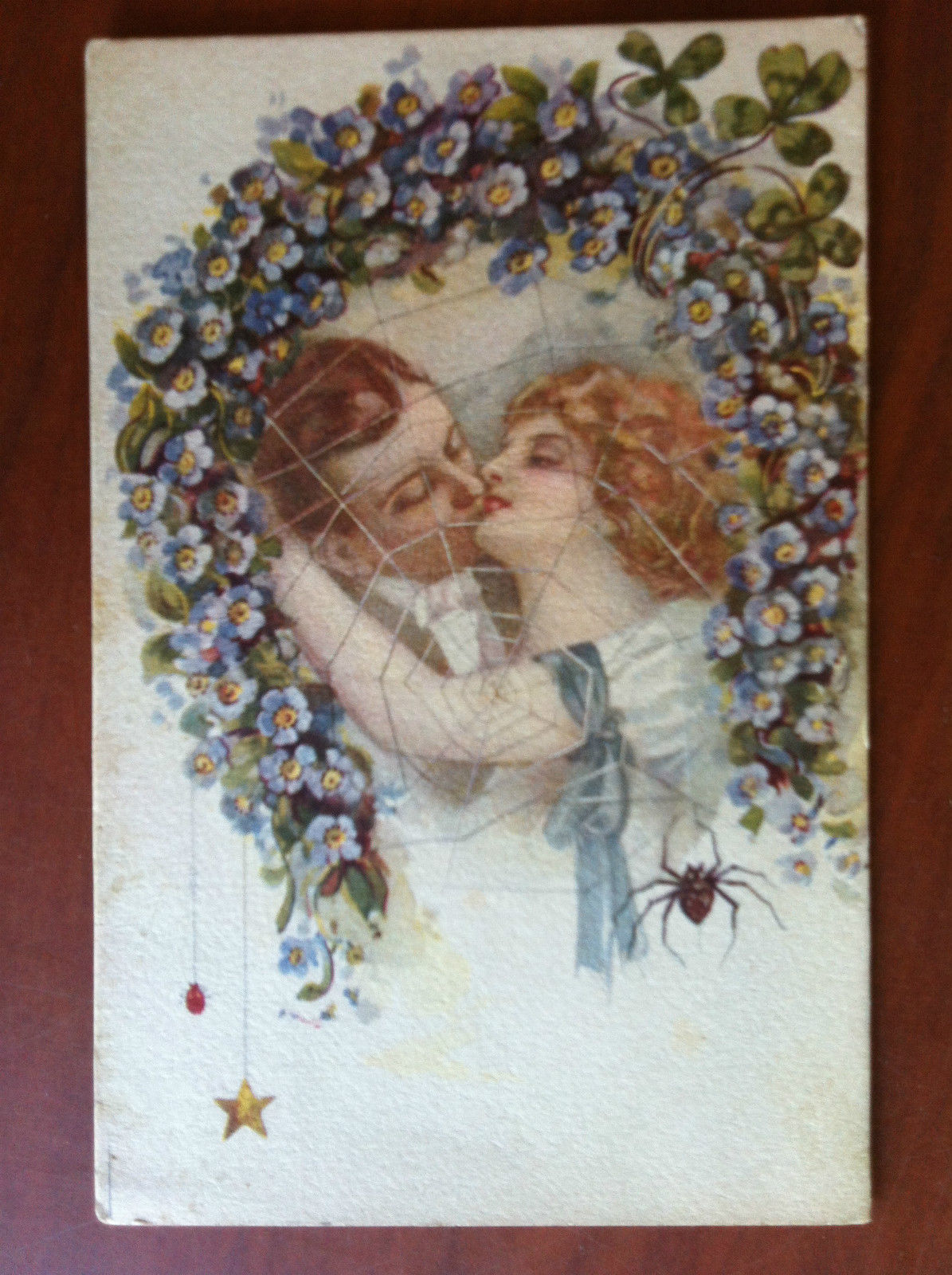 Cartolina inizi '900 Il bacio degli amanti nella tela del …