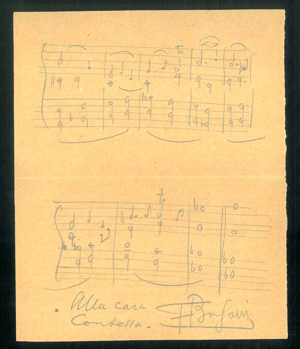 Autografo originale su foglietto con partitura e dedica.