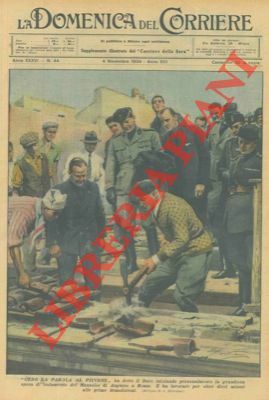 Il Duce inizia personalmente, piccone alla mano, la grandiosa opera …