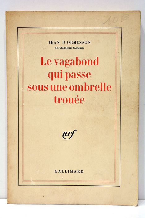 Le vagabond qui passe sous une ombrelle trouée.