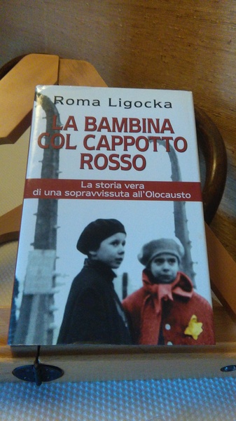 LA BAMBINA COL CAPPOTTO ROSSO