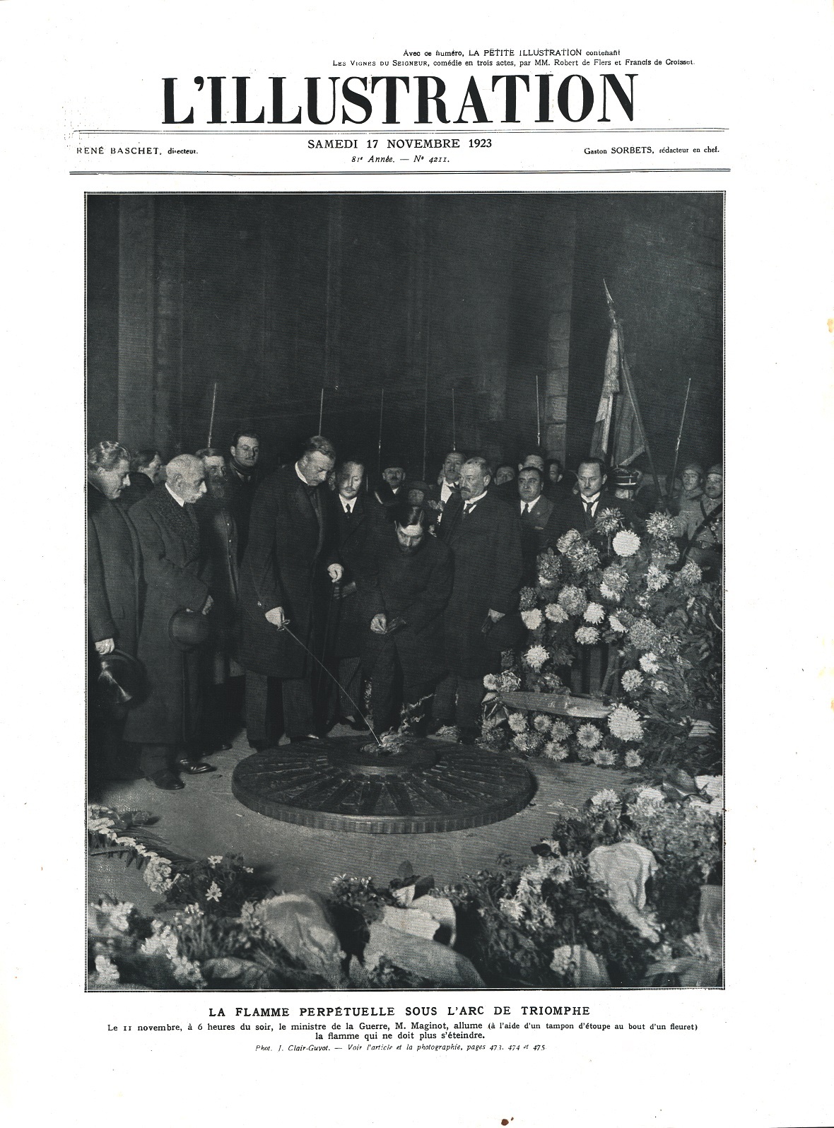 M. Maginot allume la flamme perpetuelle sous l'Arc de Triomphe. …