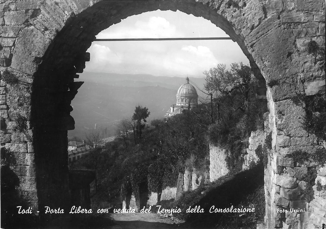 Todi. Porta Libera con veduta del Tempio della Consolazione. Alterocca. …