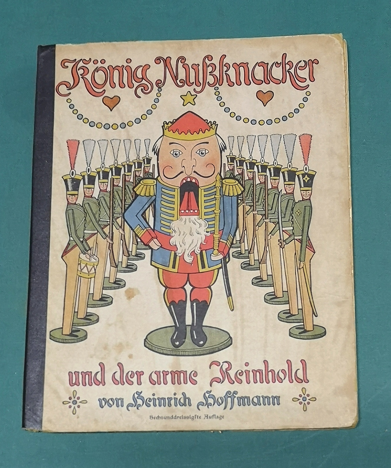K&amp;ouml;nig Nu&amp;szlig;knacker und der arme Reinhold. Ein Kinderm&amp;auml;rchen in Bildern.