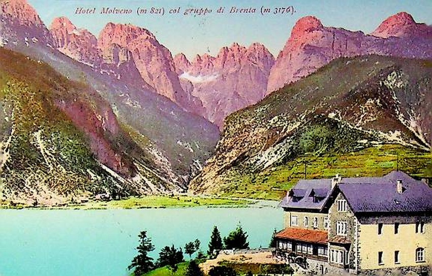 Hotel Molveno (m. 821) col Gruppo di Brenta (m. 3176).