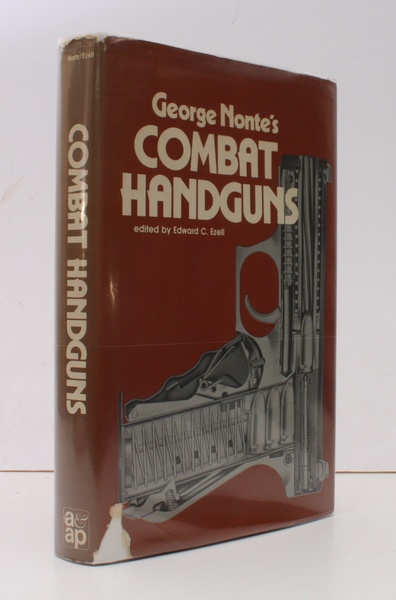 Combat Handguns. Edited by Edward C. Ezell. NEAR FINE COPY …