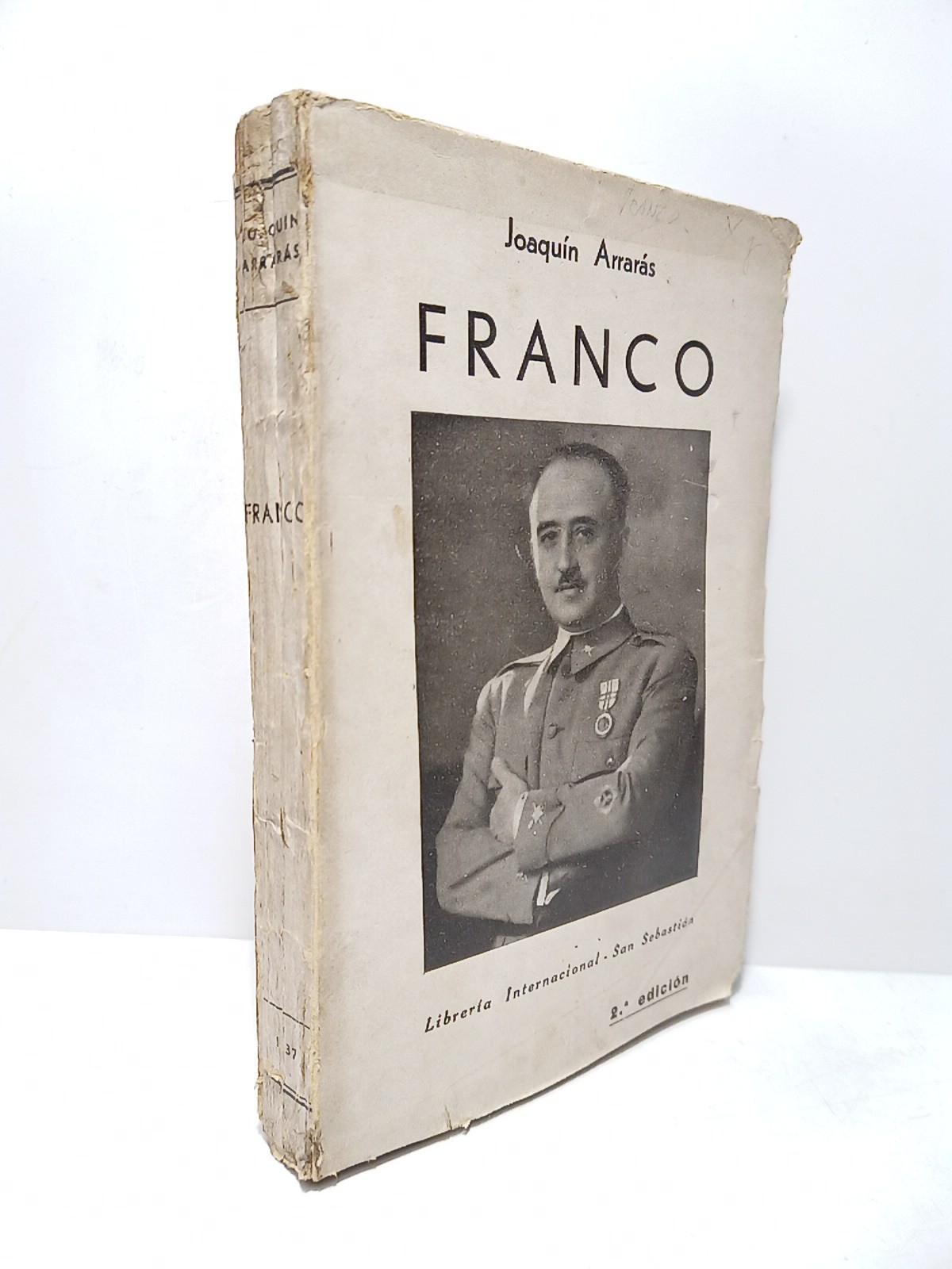 Franco / Con un verso tras la portada dedicado a …