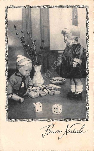 Cartolina Buon Natale bambole e dadi 1938