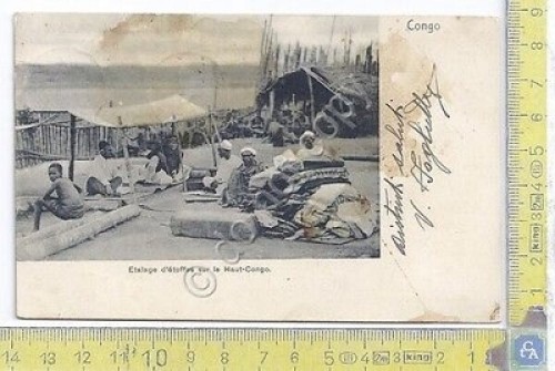 Cartolina Congo Belge - Etalage d'etoffes sur le Haut Congo …