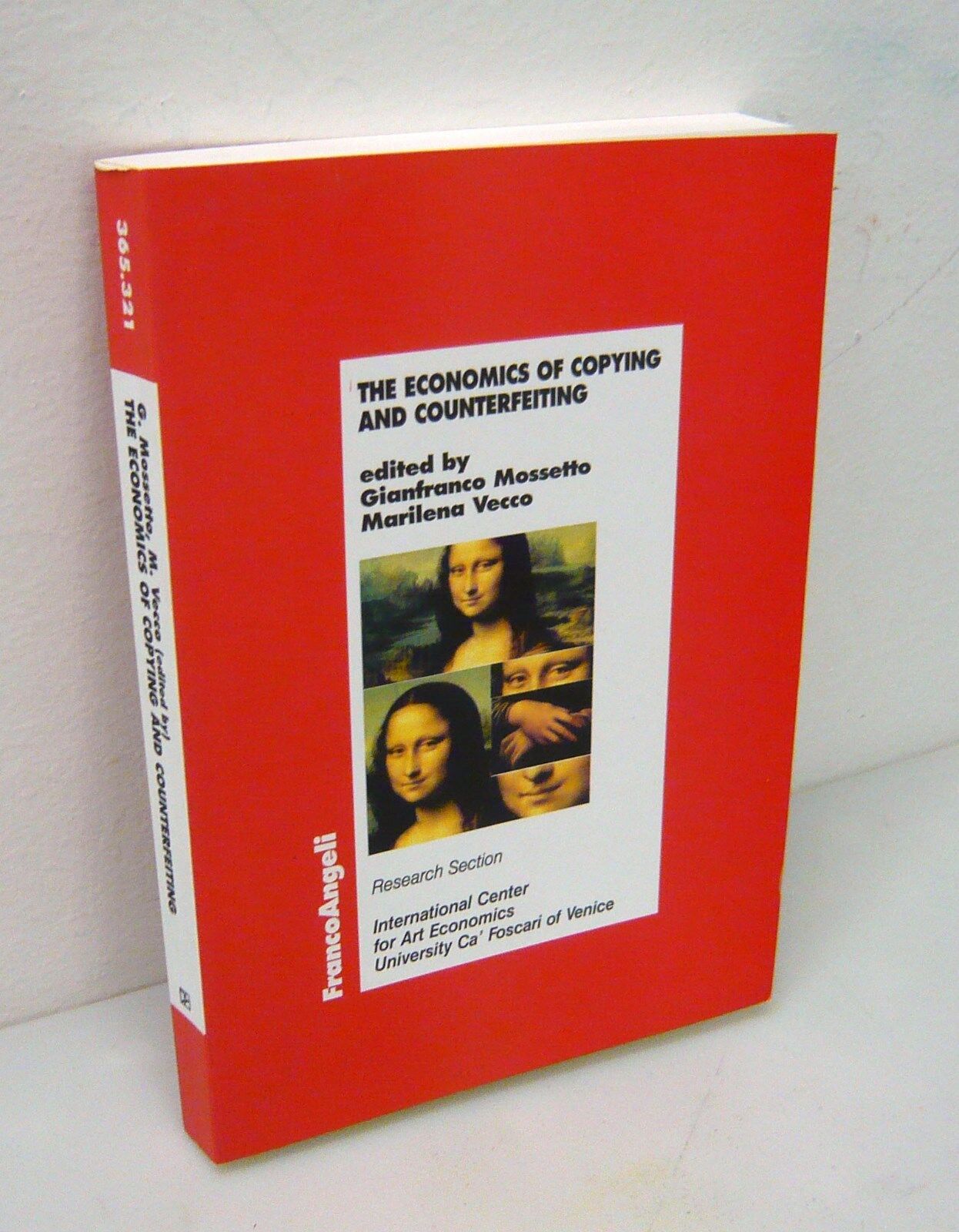 Mossetto,THE ECONOMICS OF COPYING AND COUNTERFEITING,'04[economia,contraffazione