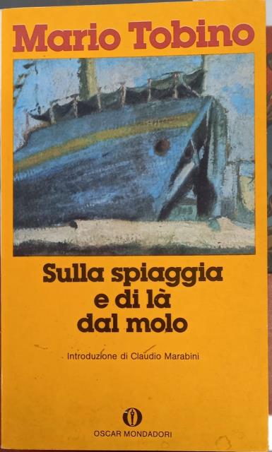 SULLA SPIAGGIA E DI LA' DAL MOLO.