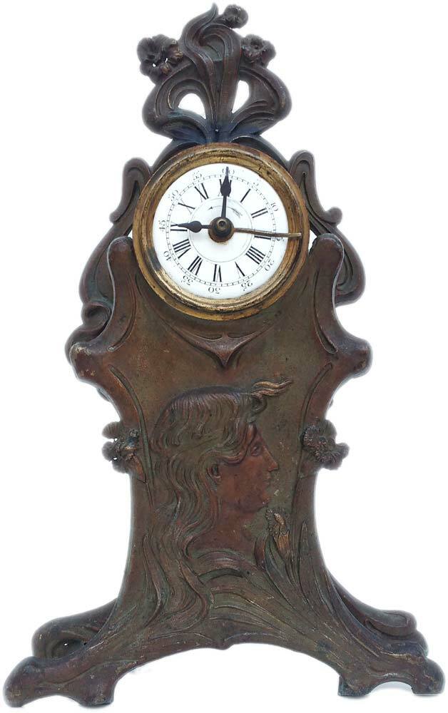 Antico orologio da tavolo in antimonio bronzato d'epoca e stile …
