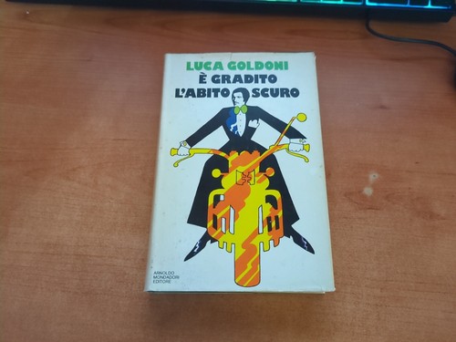 È gradito l'abito scuro- Luca Goldoni