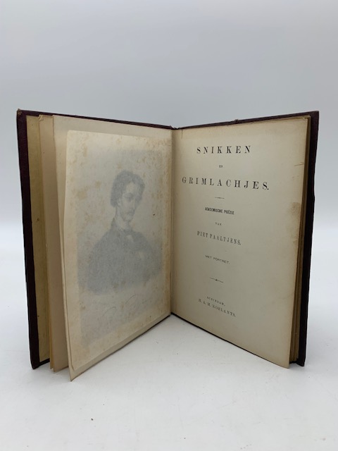 Snikken en grimlachjes. Academische poezie