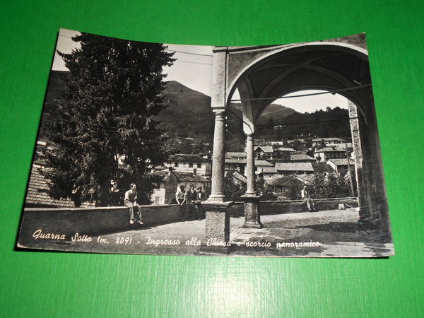 Cartolina Quarna Sotto - Ingresso alla Chiesa e scorcio panoramico …