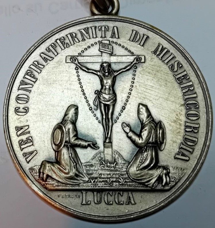 Medaglia in argento, diametro, cm. 4.