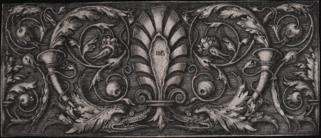 Fregio con palmetta tra volute foliate [Testa grottesca di un …