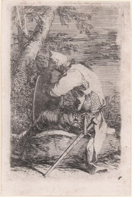 Soldato seduto appoggiato alla scudo