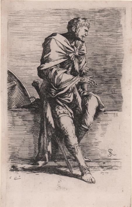 Soldato seduto su un muretto