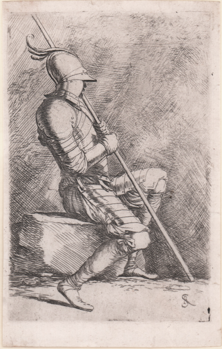 Soldato seduto su una pietra