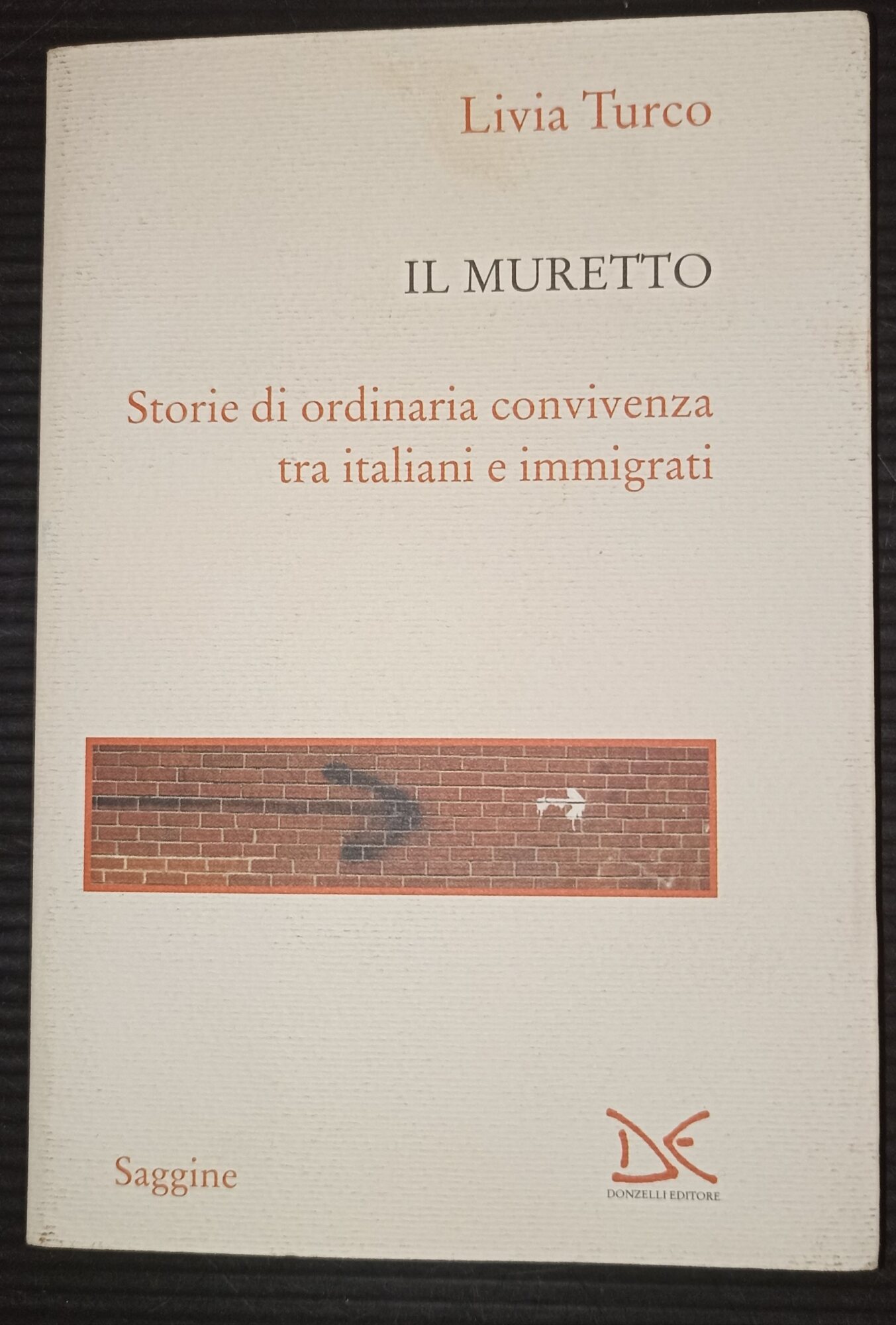 Il muretto -storie di ordinaria convivenza tra italiani e immigrati