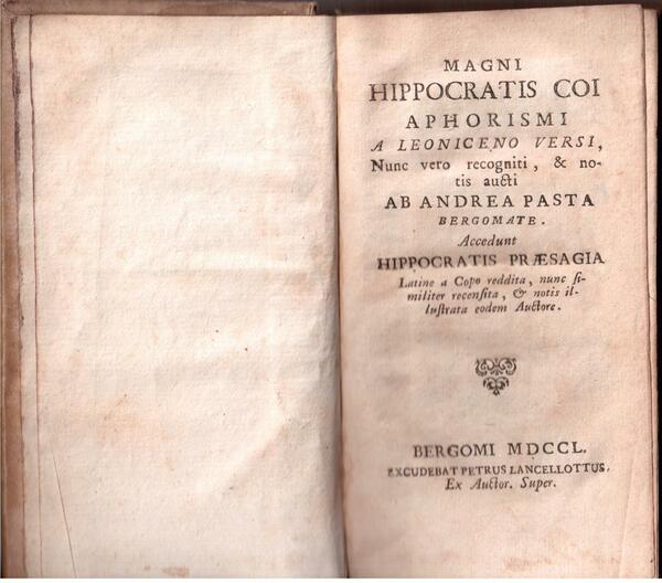 Magni Hippocratis coi aphorismi a leoniceno versi.