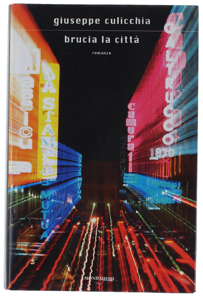 BRUCIA LA CITTA'. Prima edizione.