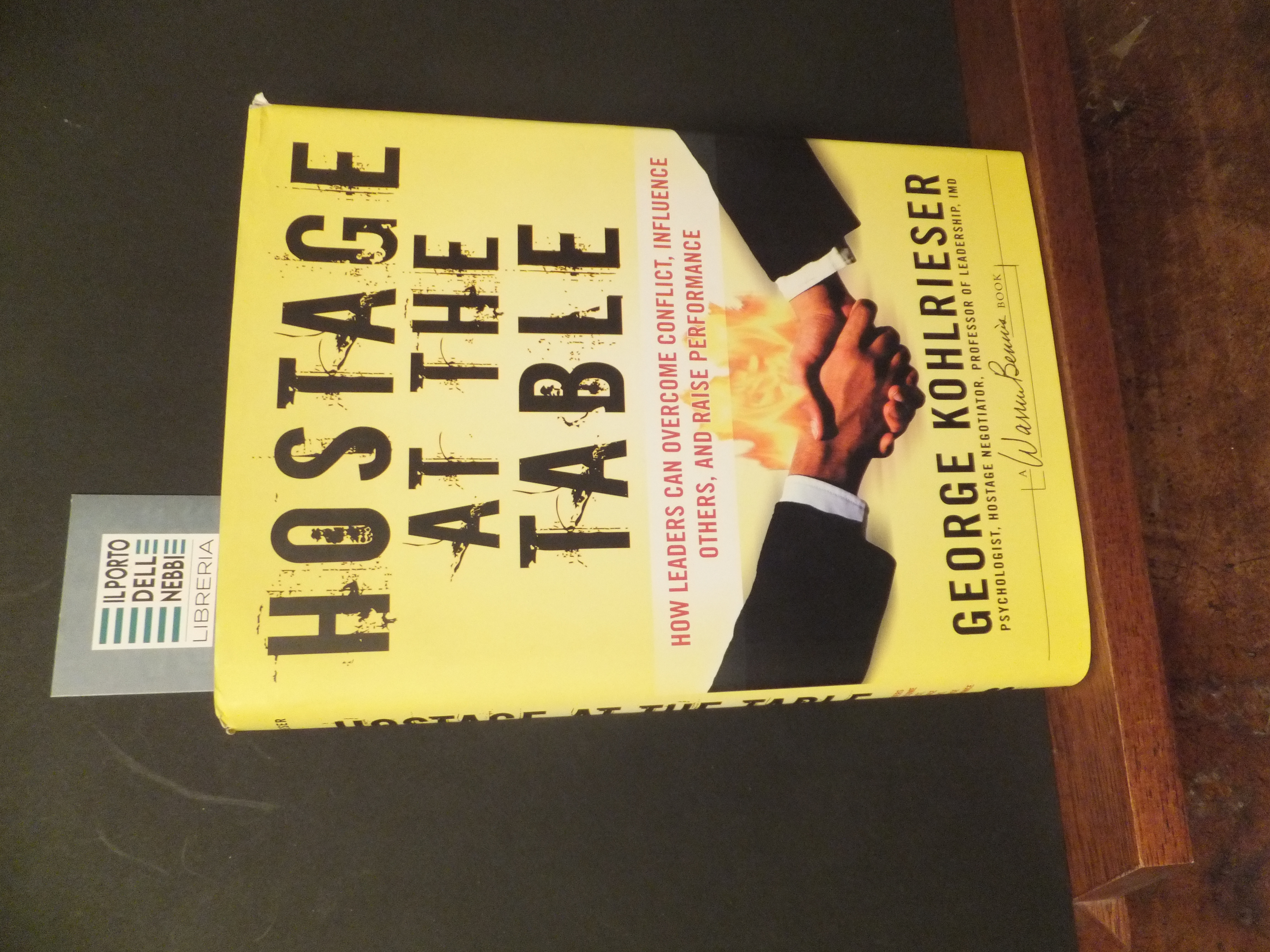 HOSTAGE AT THE TABLE