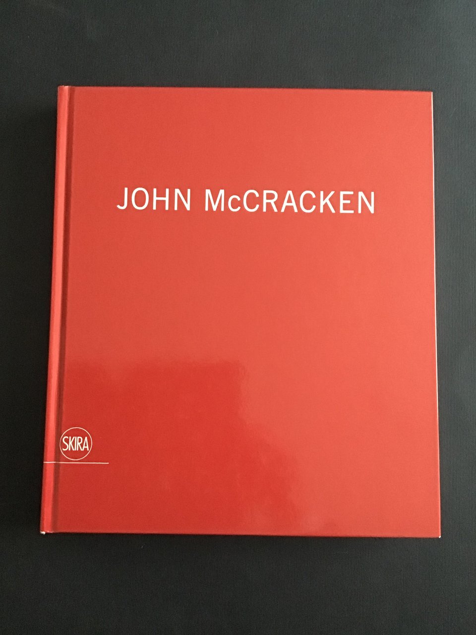 JOHN McCRACKEN