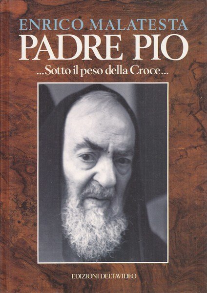 Padre Pio sotto il peso della croce