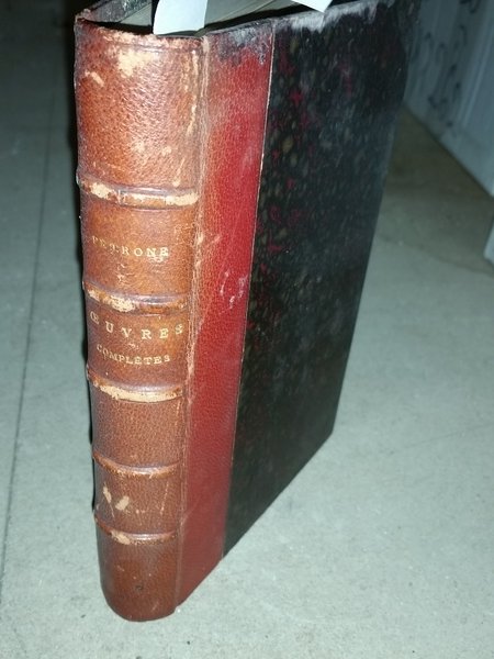 OEUVRES COMPLETES DE PETRONE AVEC LA TRADUCTION FRANCAISE DE LA COLLECTION PANCKOUCKE PAR M.HEGUIN DE GUERLE ET PRECEDEES DES RECHERCHES SCEPTIQUES SUR LE SATYRICON ET SON AUTEUR PAR J.N.M. DE GUERLE / NOUVELLE EDITION .
