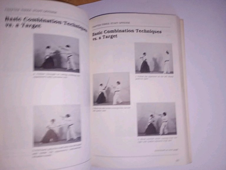 Weapons kumite. fighting with traditional weapons