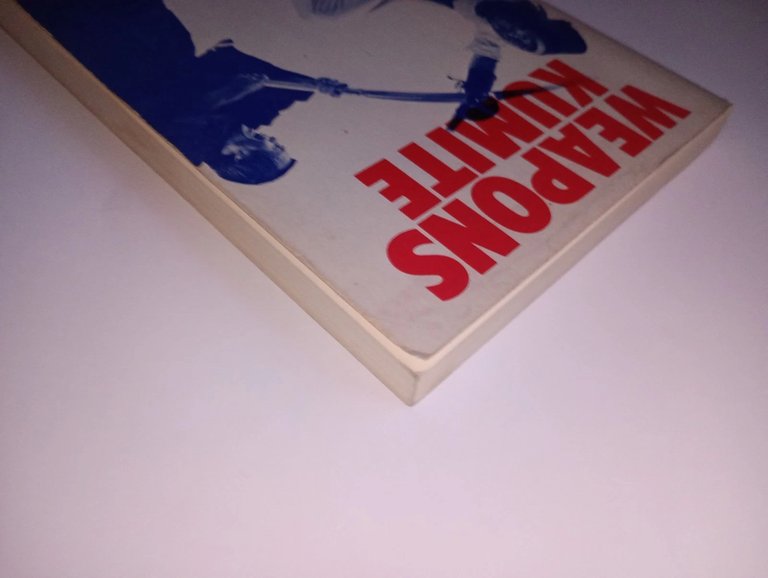 Weapons kumite. fighting with traditional weapons