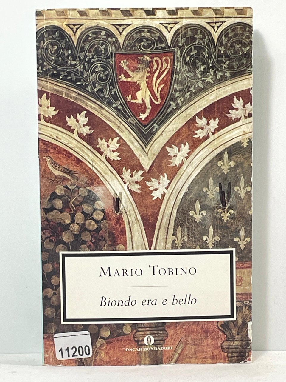 Biondo era e bello