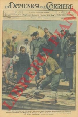 Il Duce inizia personalmente, piccone alla mano, la grandiosa opera …
