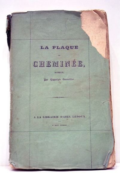 La plaque de cheminée.
