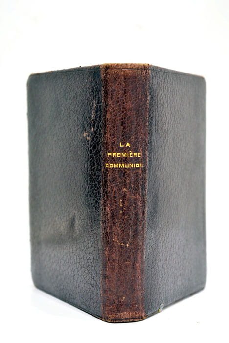 La première communion et le Chrétien sanctifié par les Sacrements.