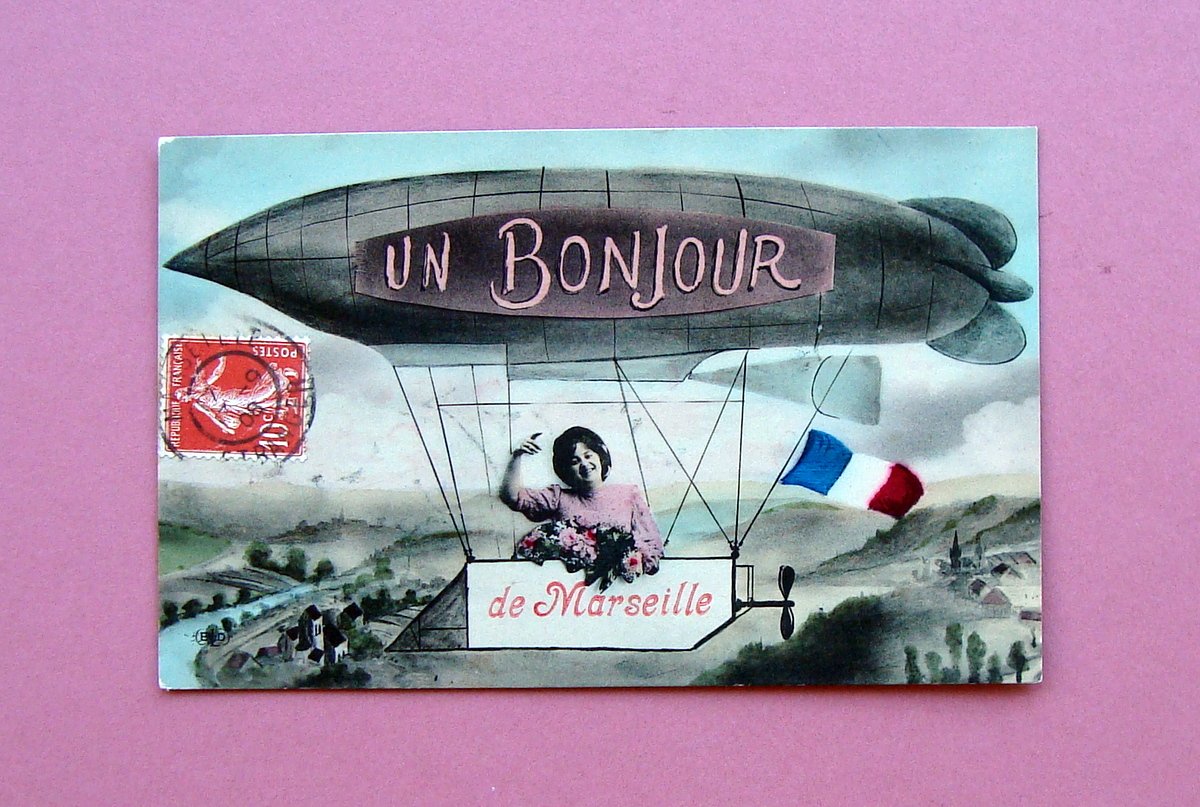 Cartolina Illustrata colori un Bonjour de Marseille dirigibile Viaggiata