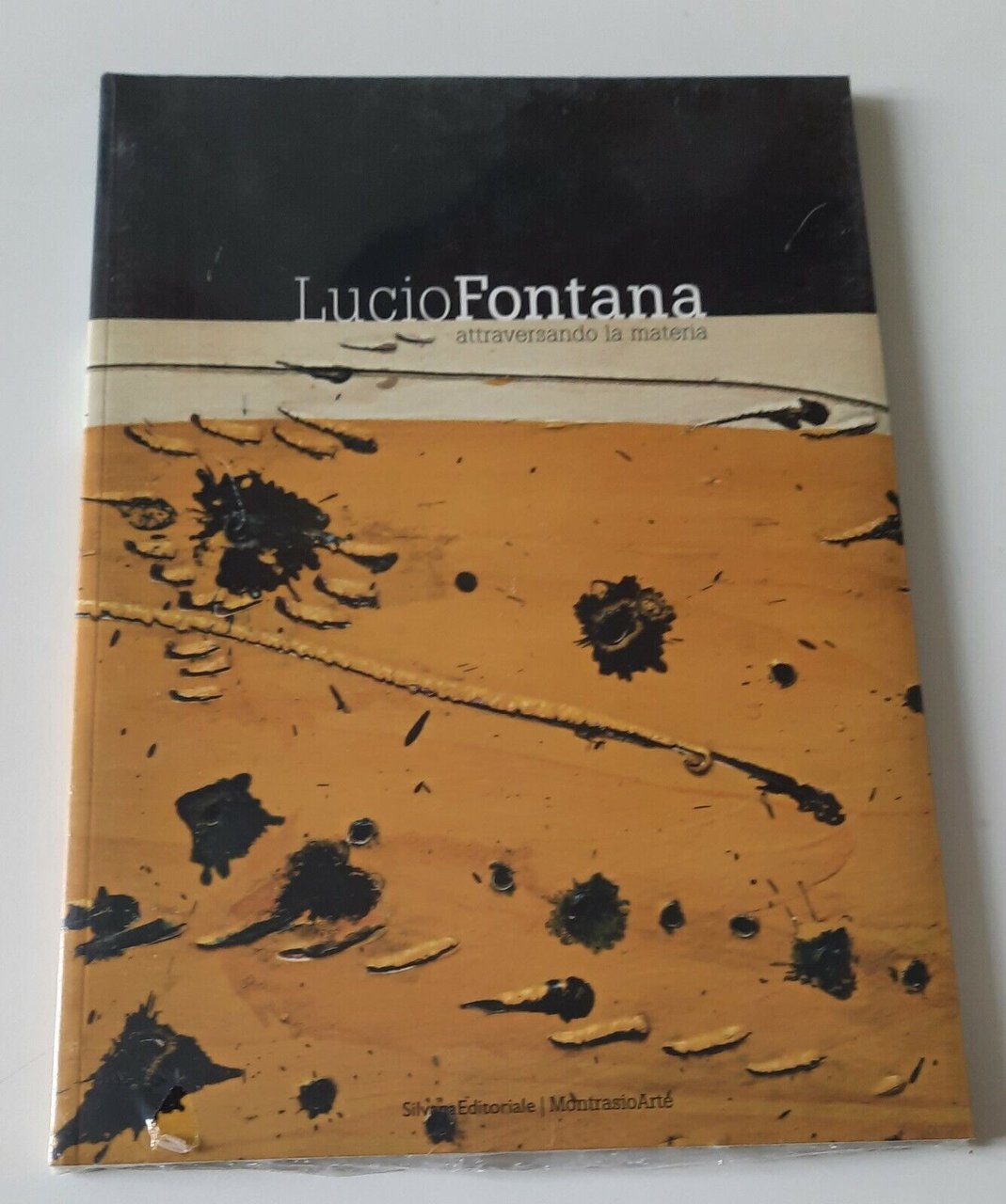 LUCIO FONTANA ATTRAVERSANDO LA MATERIA SILVANA ED. SIGILLATO