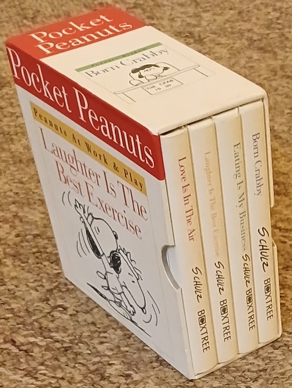 Peanuts at Work & Play (4 Books in slipcase) | Immagine principale