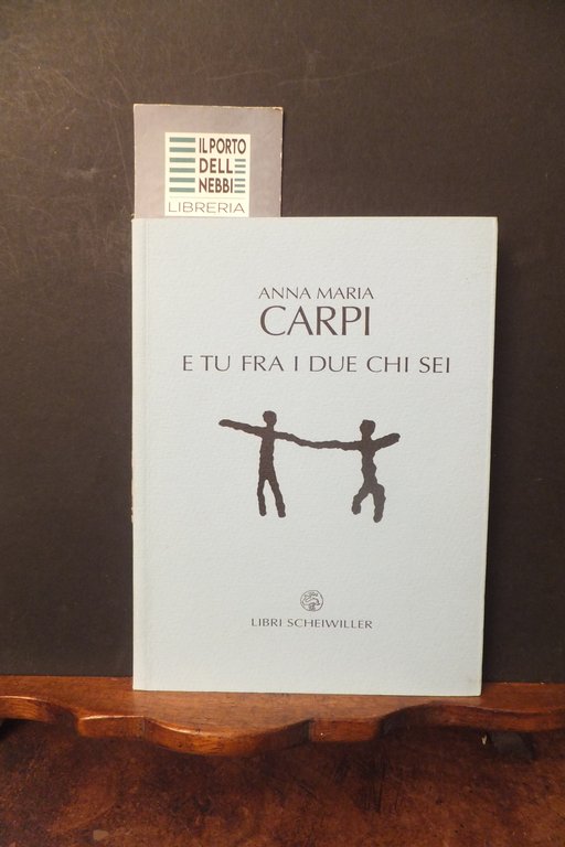 E TU FRA I DUE CHI SEI  ANNA MARIA CARPI
