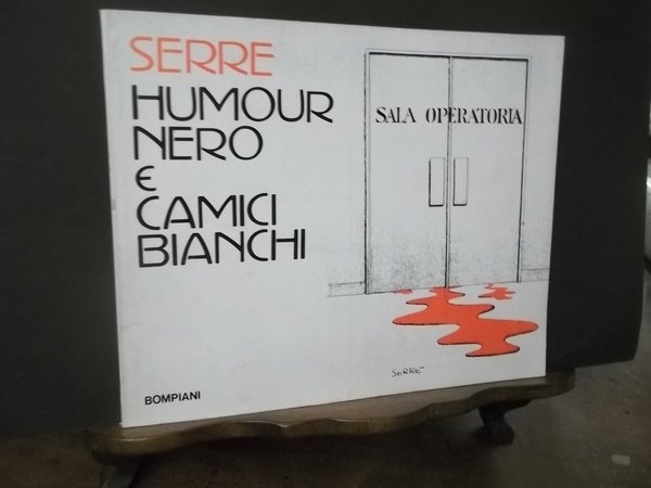 HUMOUR NERO E CAMICI BIANCHI