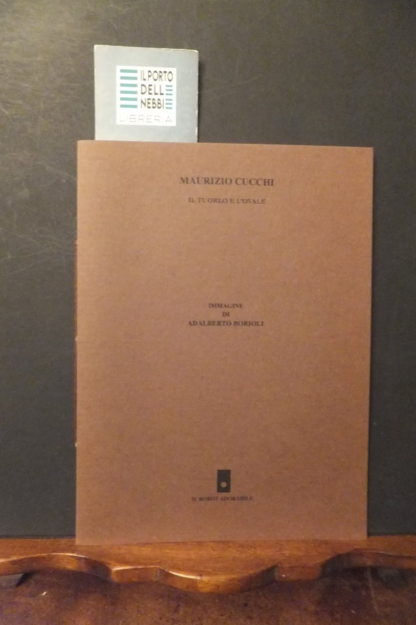 IL TUORLO E L'OVALE MAURIZIO CUCCHI IMMAGINE ADALBERTO BORIOLI | Immagine principale