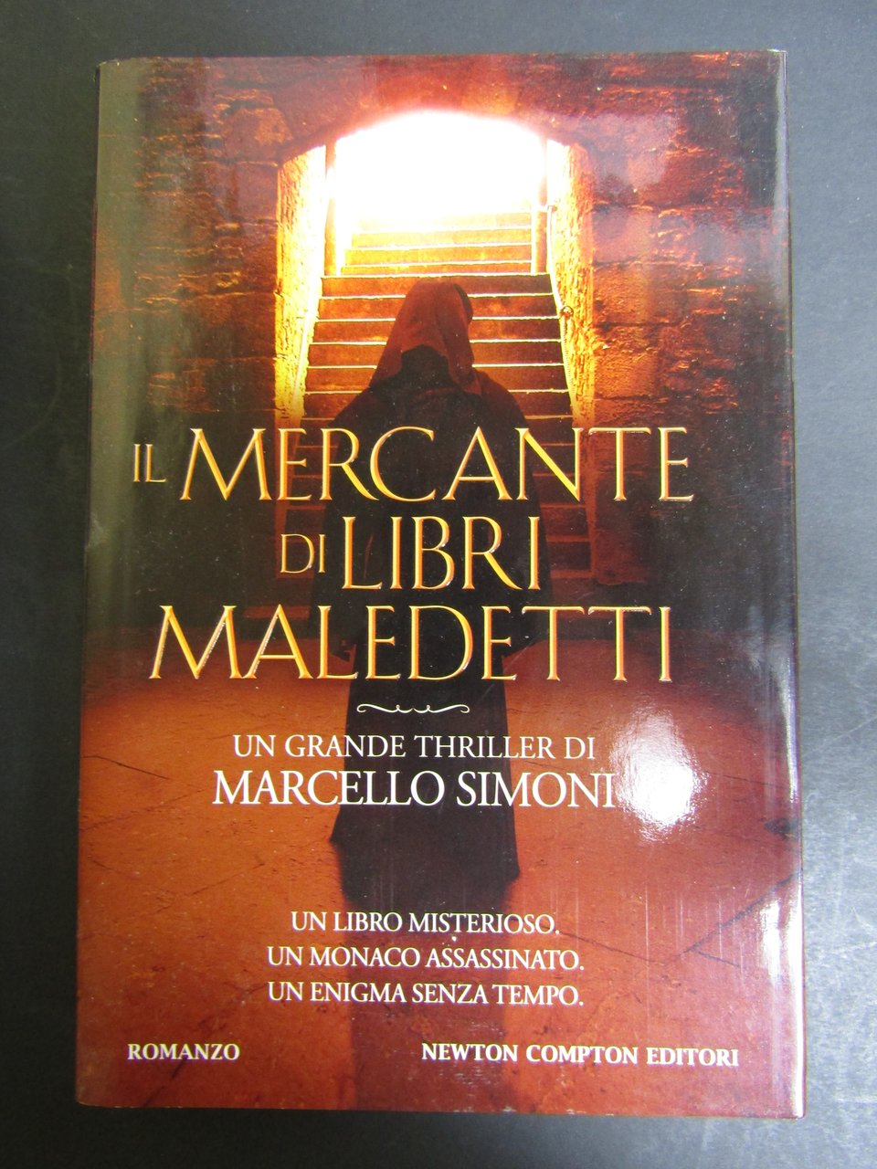 Simoni Marcello. Il mercante di libri maledetti. Newton Compton. 2011 | Immagine principale