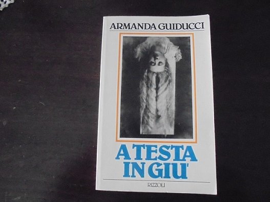 A TESTA IN GIU`