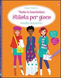 Moda autunno. Vesto le bamboline. Stilista per gioco. Con adesivi
